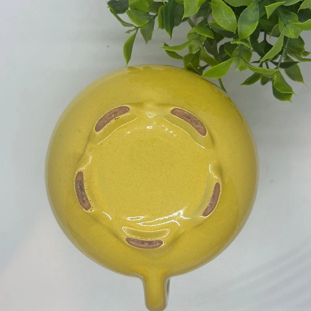 Frankoma Pottery Yellow MCM #82 Carafe dating back to the 1950s.